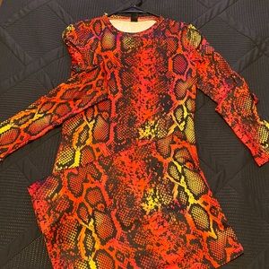 Red with a hint of yellow snake skin long fitted dress with sleeves